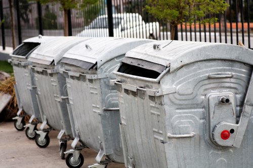Exterior view of a skip on a residential street in Hillingdon